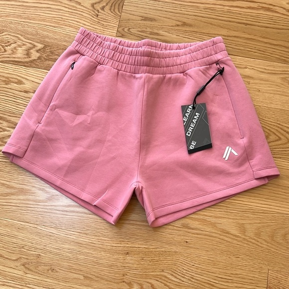New! Alphalete women’s relaxed shorts confetti in size medium.
